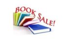 Here's an alt tag for the image: `Book sale: colorful books on display`